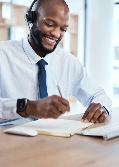 Customer service, consulting notebook and black man writing telemarketing summary for contact us CRM. Call center communication, e commerce telecom or information technology consultant on microphone.